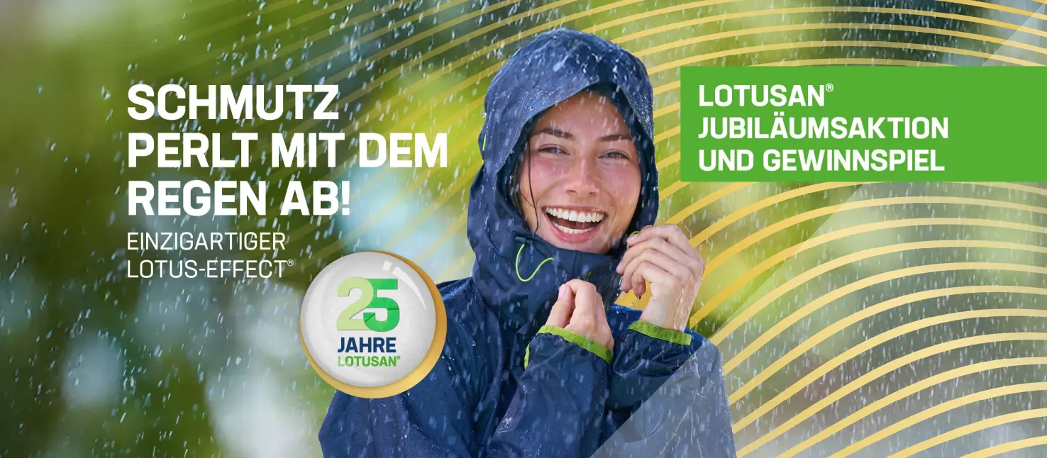Young woman standing in the rain in a good mood