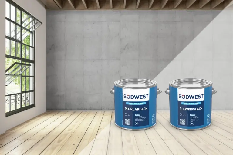 Loft-style interior with wooden floor, grey wall and window